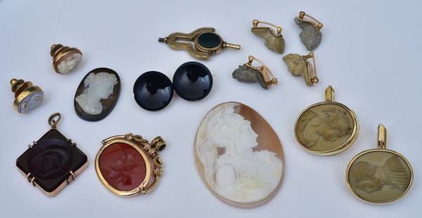 Victorian Intaglio Cuff Links, Watch Fobs and Pins (14): Pair of cuff links, 1" long, four figural pins, onyx brooch, two intaglio watch fobs, watch key with bloodstone, two cameo pins and two uncased cameos, the largest 2" long