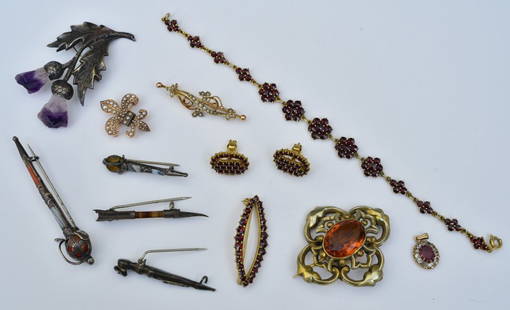 Scottish Agate Brooches and Garnet Jewelry: Five silver Scottish pins, the thistle brooch set with amethysts, the largest 2 3/4" long together with Garnet brooch, pierced earrings and bracelet, three Victorian brooches including seed pearls and