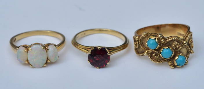 Three 14k Gold Rings: Garnet, Opal and Persian Turquoise, ring sizes 6 to 6 1/2, weight is 6.8 dwt gross