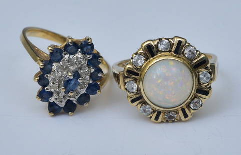 Two 10k Gold Diamond Rings: Opal 9mm surrounded by eight diamonds and black enameled accents, ring size 7 1/4 and a Sapphire and diamond ring, ring size 6 1/4, weight is 4.4 dwt gross