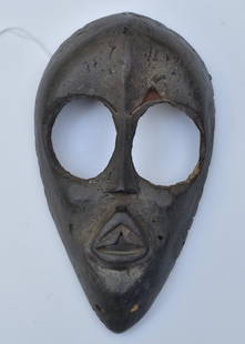 Early African Mask: probably Dan culture, 8 1/4" long,collected by the consignor's father, Walter Skor, in New York City prior to retiring to Connecticut in 1951.