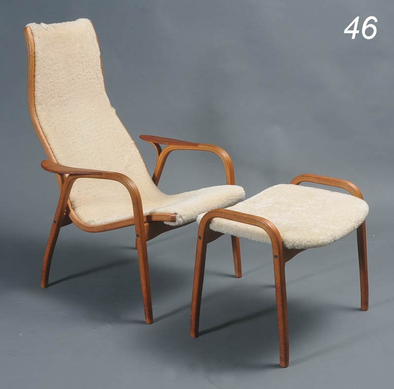 YNGVE EKSTROM for Swedse lounge chair and ottoman w: YNGVE EKSTROM for Swedse lounge chair and ottoman with sheepskin 39" high Shipping Information: Buyer is responsible for arranging 3rd party shipping.