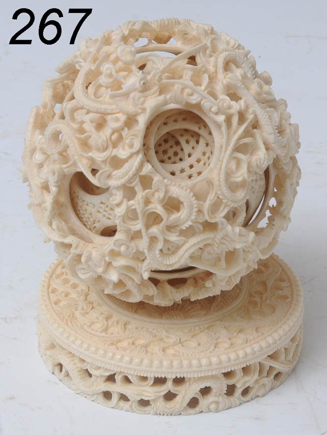 CHINESE CARVED IVORY PUZZLE BALL with eight balls : CHINESE CARVED IVORY PUZZLE BALL with eight balls inside 4" diameter Shipping Information: Shipping within the Continental USA (excludes insurance):$20, International buyers are responsible for arrang