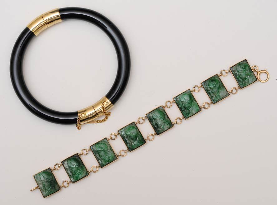 Chinese Jade Bracelet and Onyx Cuff Bracelet: bracelet 7" long estimate 300/500 $20 Shipping available within the Continental USA . This amount excludes insurance which will be calculated based upon the selling price. All International shipping w
