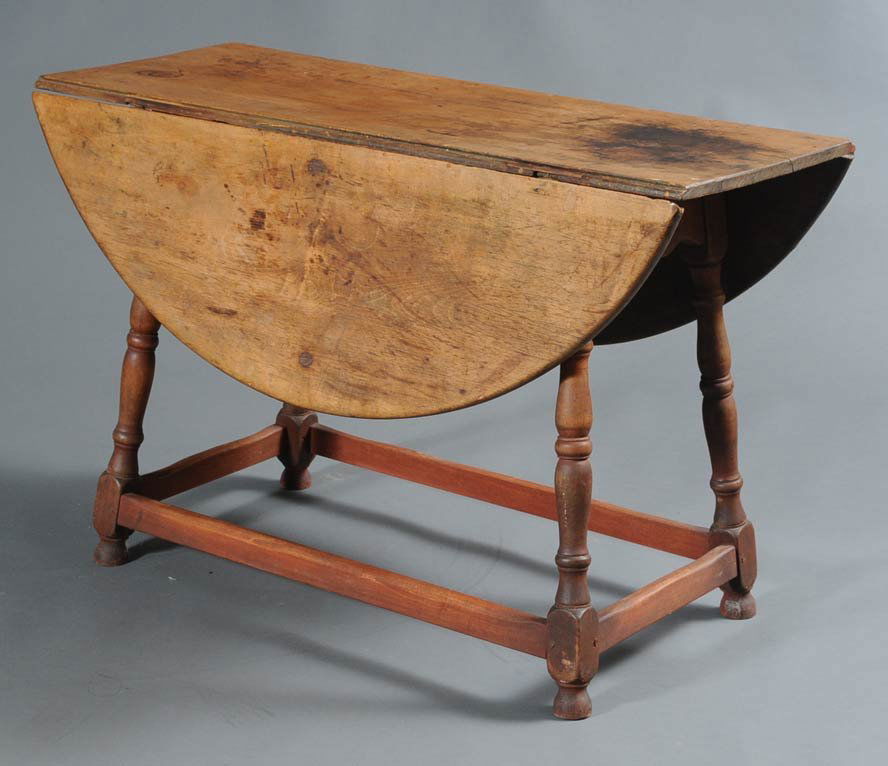 Queen Anne Drop Leaf Table: with scrub top and assembled base 44" long x 29" high " 46 1/2" wide (open) 18th century estimate 600/900 Buyer is responsible for arranging 3rd party shipping.