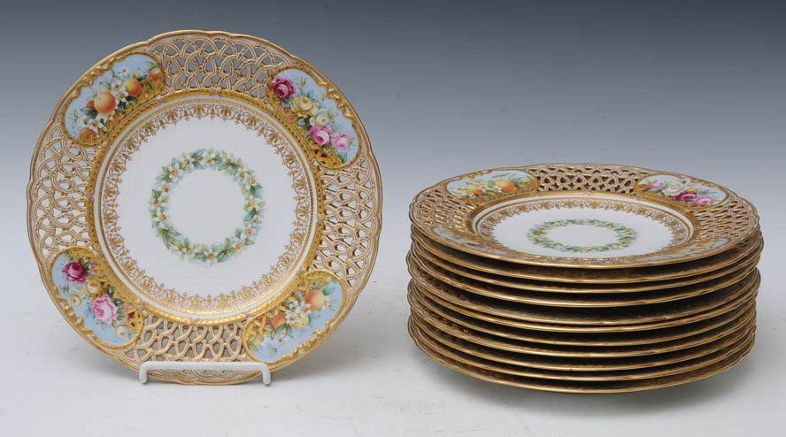 Set of 12 Spode Reticulated Dessert Plates: with hand painted floral panels in the border, each 9" diameter estimate 300/500 $60 Shipping available within the Continental USA . This amount excludes insurance which will be calculated based upon