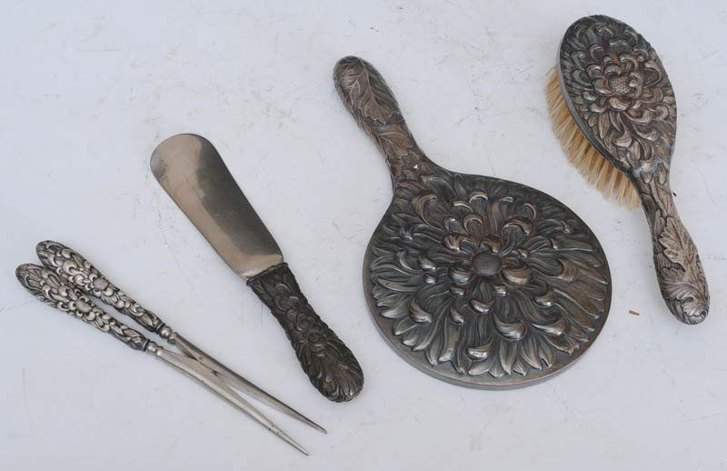 Japanese Meiji Silver Dresser Set: four pieces circa 1910 estimate 200/300 $30 Shipping available within the Continental USA . This amount excludes insurance which will be calculated based upon the selling price. All International ship