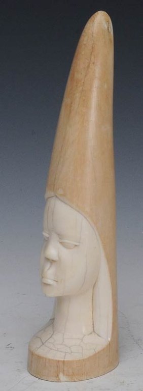 African Carved Bust of Nubian Figure: 9" high estimate 300/500 $30 Shipping available within the Continental USA . This amount excludes insurance which will be calculated based upon the selling price. All International shipping will be th