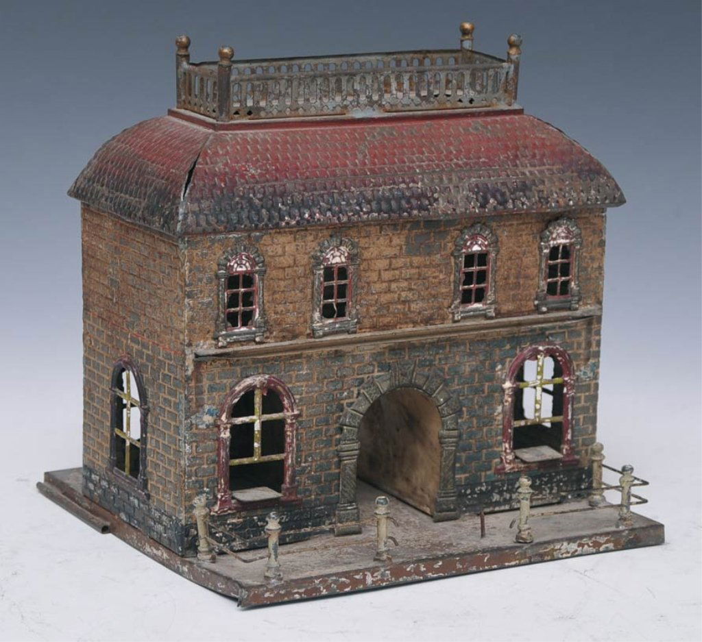German Tin Train Station: with removable top 9 1/2" x 5 3/4" circa 1900 estimate 200/300 $30 Shipping available within the Continental USA . This amount excludes insurance which will be calculated based upon the selling price.