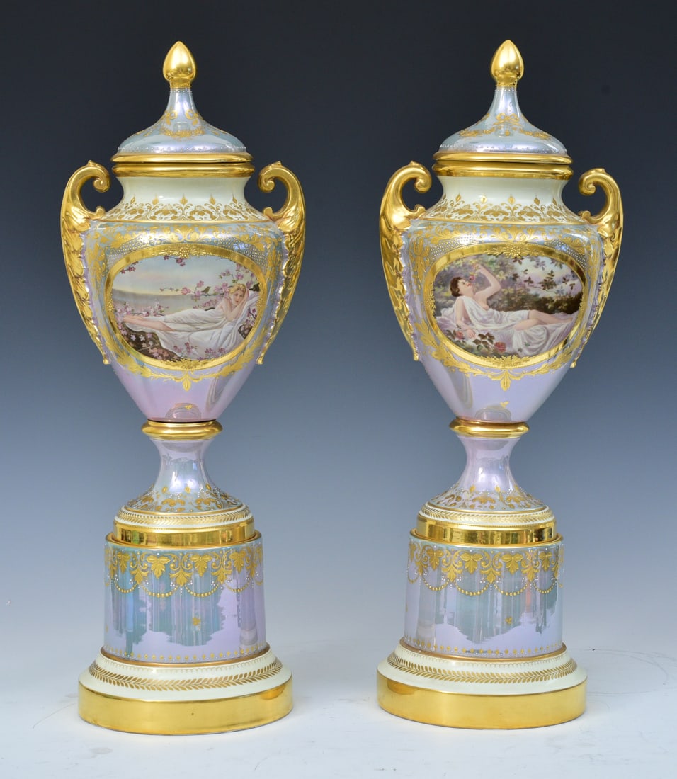 Impressive Pair of Royal Vienna Style Hand Painted Porcelain Urns: Impressive Pair of Royal Vienna Style Hand Painted Porcelain Urns 21" high, 7 1/2" diameter with pink luster bodies and finely hand painted beauties a unique pair on each side circa 1910