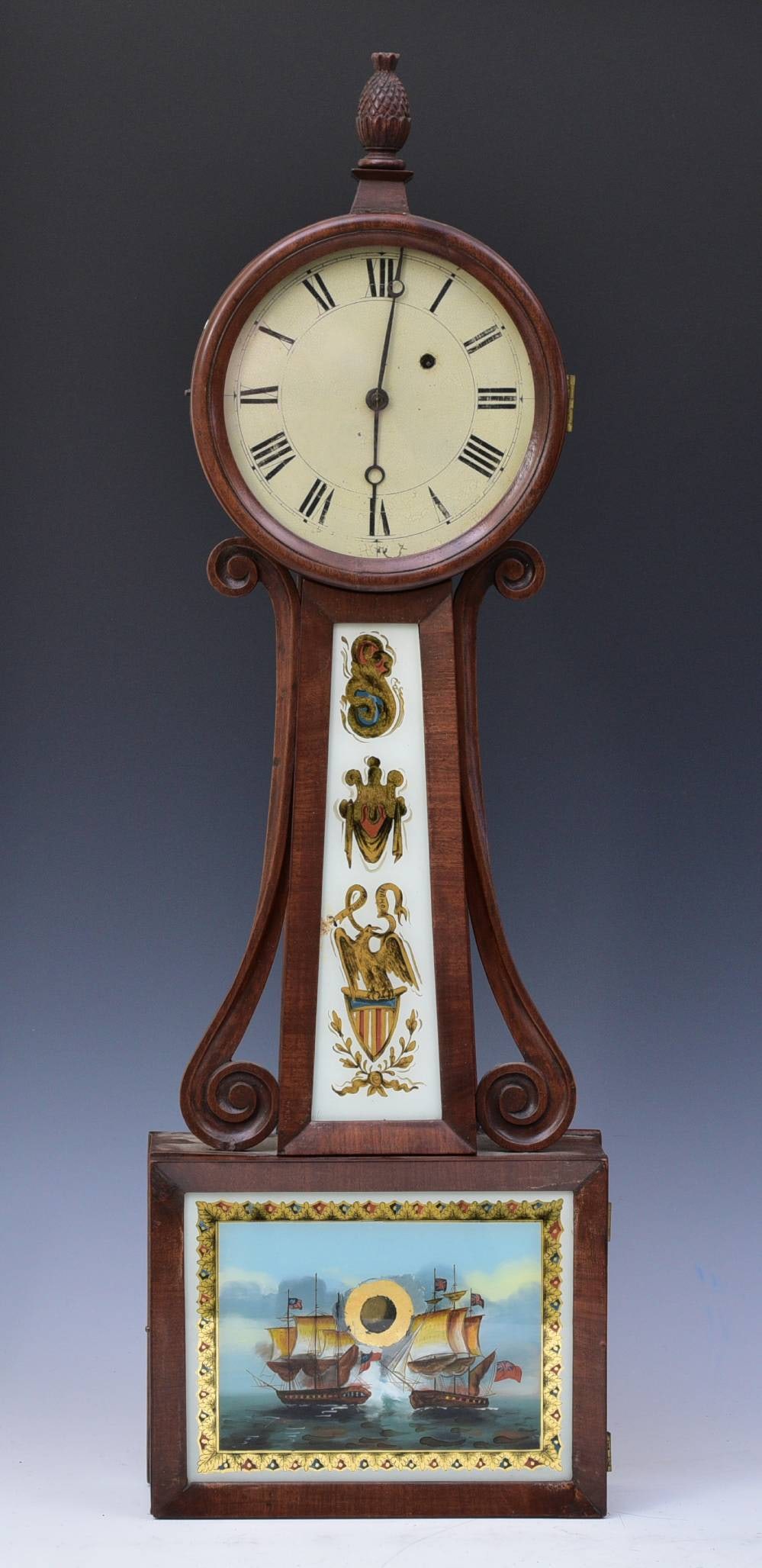 Federal Mahogany Banjo Clock: Federal Mahogany Banjo Clock with Naval scene and eagle on throat glass carved acorn finial 32" long early/mid 19th century