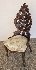 attributed to Elija Galusha, pierce carved Victorian Walnut Parlor Chair