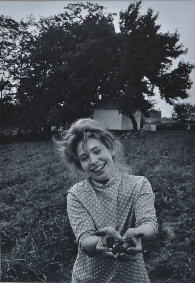 W. Eugene Smith (1918-1978) Strawberry Girl: W. Eugene Smith (1918-1978) Strawberry Girl 18"x12 1/2" silver gelatin print matted to 26"x20 1/4" signed, titled and with copyright notice verso on mount sold at Christie's, New York 2/21/2002, lot 4