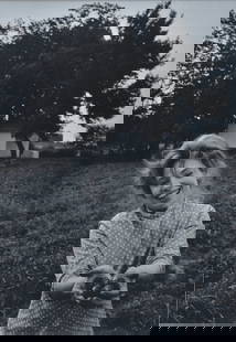 W. Eugene Smith (1918-1978) Strawberry Girl: W. Eugene Smith (1918-1978) Strawberry Girl 18"x12 1/2" silver gelatin print matted to 26"x20 1/4" signed, titled and with copyright notice verso on mount sold at Christie's, New York 2/21/2002, lot 4