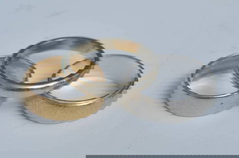 Three Gold Wedding Bands: Three Gold Wedding Bands18k gold wedding band, ring size 7Two 14k white gold bands, ring size 8 1/2weight: 9.4
