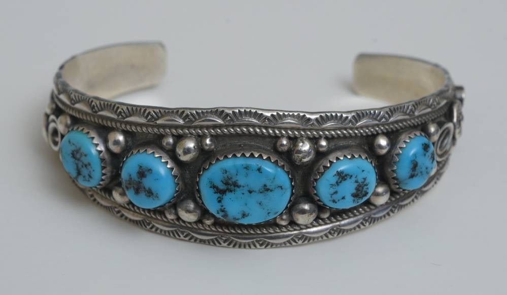 Navajo Sterling Silver Turquoise Cuff Bracelet: Navajo Sterling Silver Turquoise Cuff Bracelet stamped "Sterling C.M." weight is .87 troy ounces gross