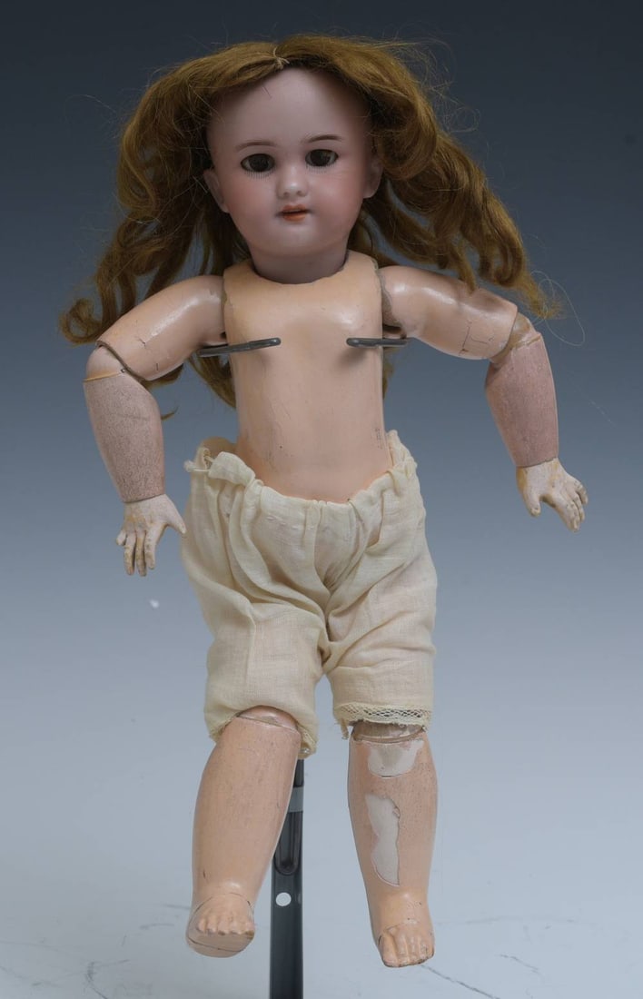 JUMEAU bisque porcelain head doll, marked DEP No. 4: JUMEAU bisque porcelain head doll glass eyes, opened mouth, upper teeth old mohair wig marked DEP No. 4 on back of neck 14" long marked on lower back late 19th/early 20th century