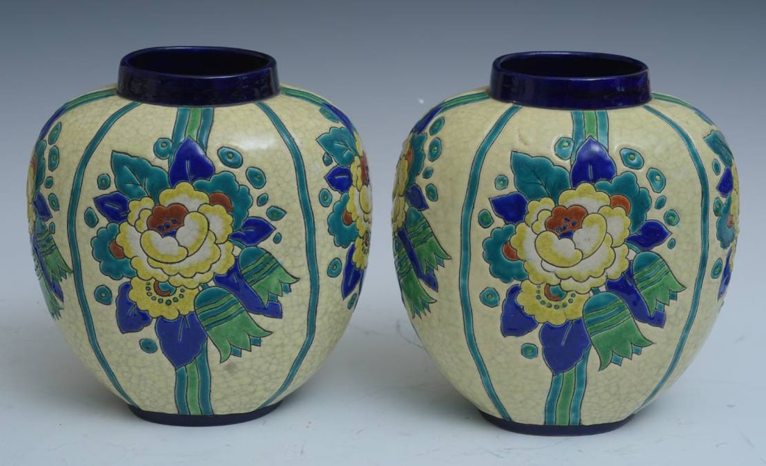 pair of Boch Freres Art Deco Vases: pair of Boch Freres Art Deco Vases with crackle glaze and stylized floral motif 9 1/4" high with makers mark on bottom, impressed "1291" circa 1925