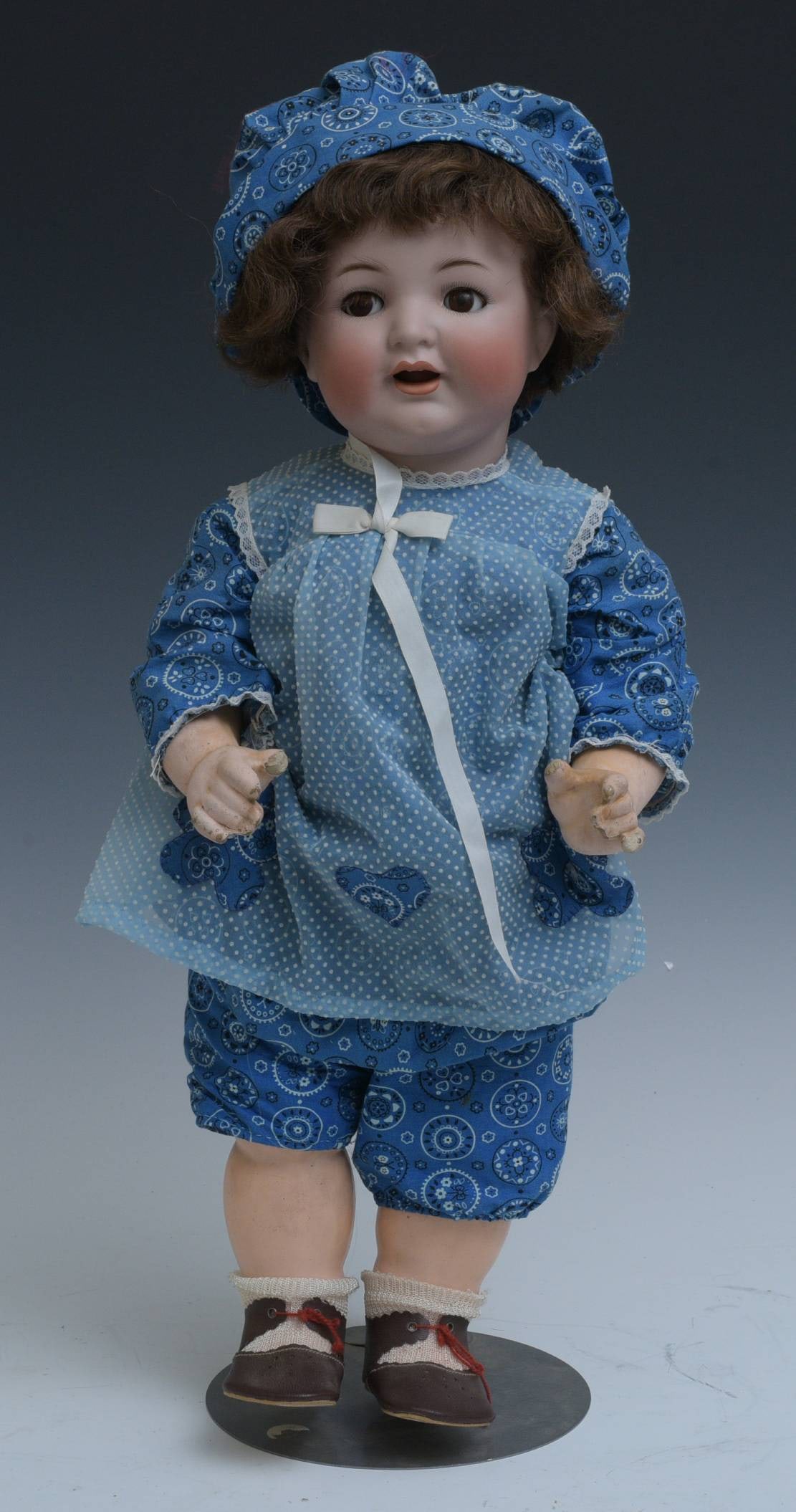 SIMON HALBIG, GERMAN BISQUE GOOGLEY EYE DOLL: SIMON HALBIG, GERMAN BISQUE GOOGLEY EYE DOLL Kramer & Reinhardt 126 back of head impressed with K star R "Simon Halbig 126/9" has two front teeth composition body stamped "Made in Germany K&W" 21" lon