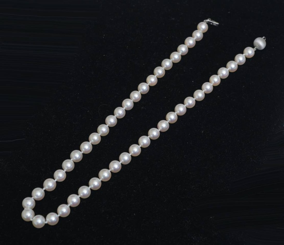 Cultured Pearl Necklace with 18k Gold Clasp: Cultured Pearl Necklace with 18k Gold Clasp approximately 8 1/2 mm pearls, 18" long