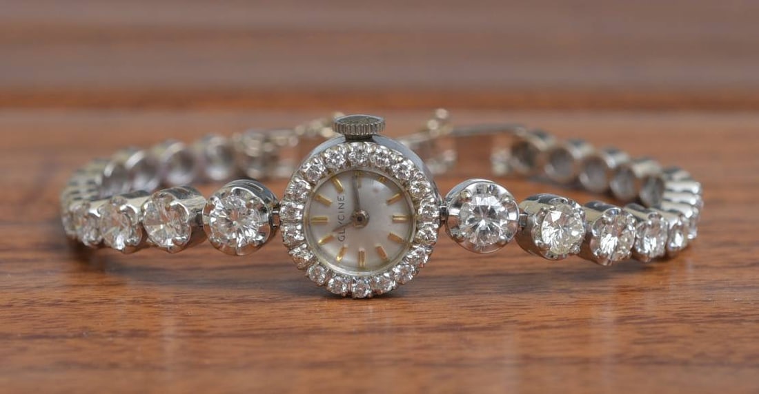 14k White Gold Diamond Ladies Wrist Watch: 14k White Gold Diamond Ladies Wrist Watch Swiss Watch by Glycine with 14k white gold dial and diamond bezel 14.6 diameter case the bracelet fitted with 26 round brilliant cut diamonds measuring 2.8-4.