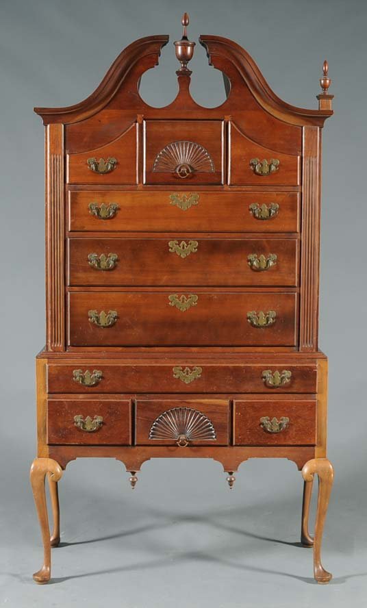 Cherry Bonnet Top Highboy: with fan carving and fluted stiles 75" high, 36" case width, 19" deep 18th century top base of later dateestimate 1200/1800 Buyer is responsible for arranging 3rd party shipping