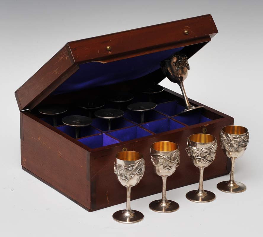 Yokohama Sterling Cordials: Boxed Set of 12 each 3 3/4" high 26 troy ounces gross estimate 800/1200 Shipping available within the Continental USA (excludes insurance) $40. International shippers are responsible for arranging 3rd