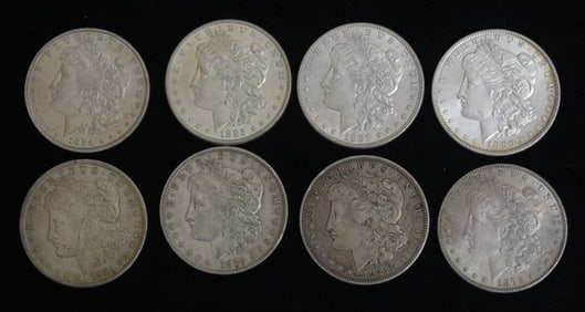 Group of Eight Morgan Silver Dollars