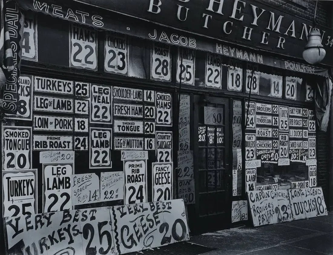 Berenice Abbott (1898-1991) Jacob Heyman Butcher Shop, 1938: Berenice Abbott (1898-1991) Jacob Heyman Butcher Shop, 1938 Gelatin silver, printed later 10 3/4"x13 1/2" mounted to board, 16"x20" unframed signed on mount lower right matted to cover signature from