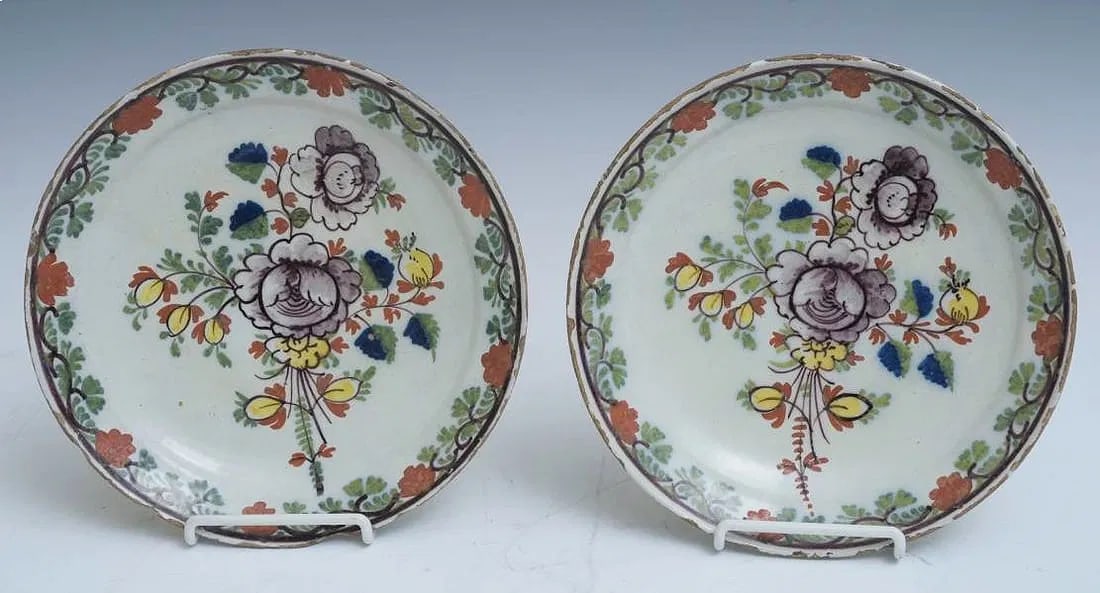 Pair of Antique Dutch Delft Polychromed Faience Plates: Pair of Antique Dutch Delft Polychromed Faience Plates with a vine and flower border 18th century 9" diameter IN HOUSE SHIPPING W/I continental USA $35 DURING CHECKOUT CHOOSE "ARRANGE MY OWN