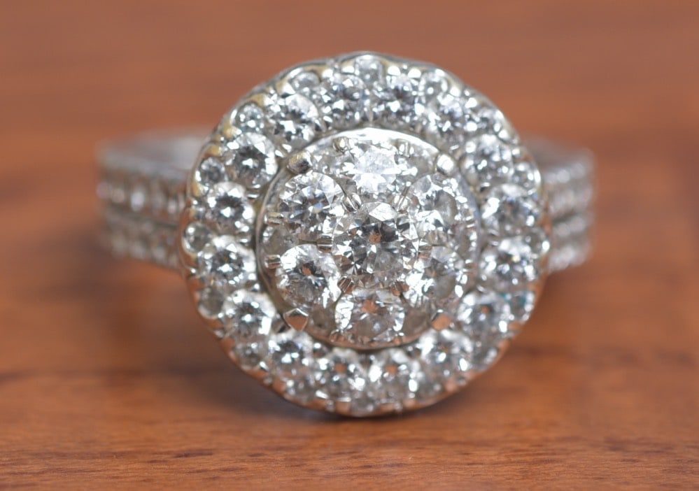 14k White Gold Diamond Cocktail Ring: 14k White Gold Diamond Cocktail Ring center diamond approximately .15 ct surrounded by diamonds approximately 2.25 ct tw ring size 7, weight is 6.6 grams gross IN HOUSE SHIPPING Within Continental