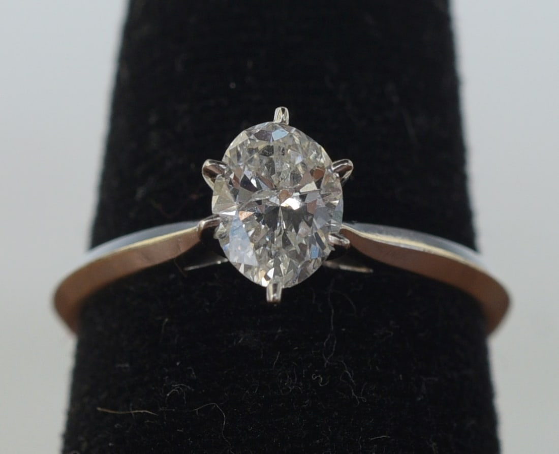 14k Gold Oval Cut Diamond Solitaire Ring: 14k Gold Oval Cut Diamond Solitaire Ring approximately 1 ct diamond, SI2, K/L color ring size 7 1/4, weight is 2.3 grams gross IN HOUSE SHIPPING Within Continental USA $25 DURING CHECKOUT CHOOSE