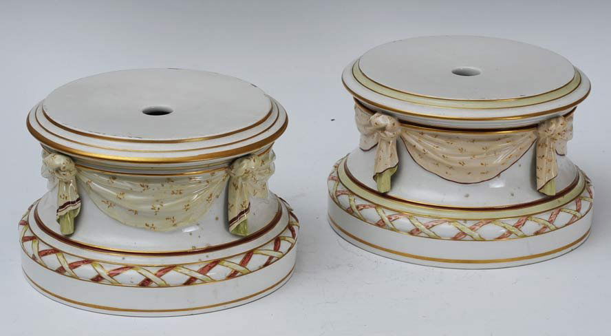 Pair KPM Pedestals: (probably for urns) 8 1/2" diameter circa 1900 estimate 400/600 Shipping available within the Continental USA (excludes insurance) $55. International shippers are responsible for arranging 3rd party s