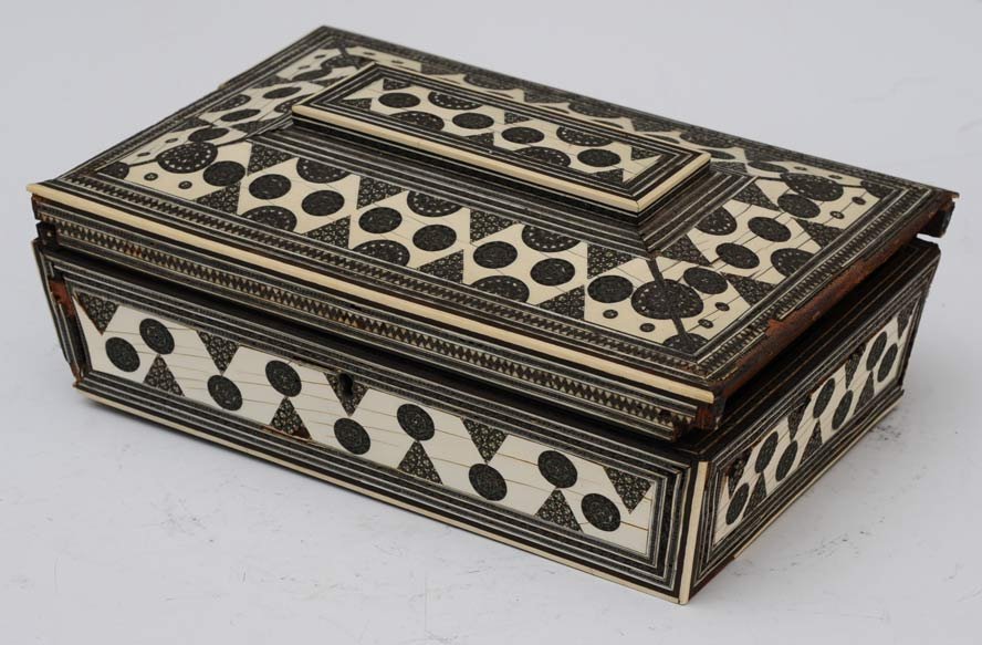 Anglo Indian Sewing Box: 9 1/2" long 19th century estimate 300/500 Shipping available within the Continental USA (excludes insurance) $35. International shippers are responsible for arranging 3rd party shipping.
