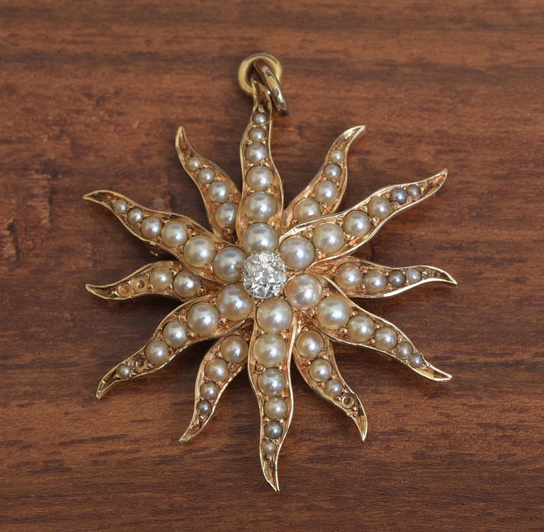 14k Gold Seed Pearl Starburst Pendant/Brooch: 14k Gold Seed Pearl Starburst Pendant/Brooch 1 1/4" long, weight is 7.4 grams gross unmarked, tests 14k gold IN HOUSE SHIPPING Within Continental USA $25 DURING CHECKOUT CHOOSE "ARRANGE MY OWN SHIPPIN