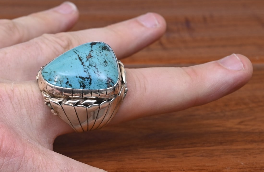 Large Navajo Turquoise Sterling Silver Ring: Large Navajo Turquoise Sterling Silver Ring 23 mm x 29 mm turquoise stone ring size 12, stamped "sterling" weight is 36.7 grams gross IN HOUSE SHIPPING within the Continental USA $25. DURING CHECKOUT,