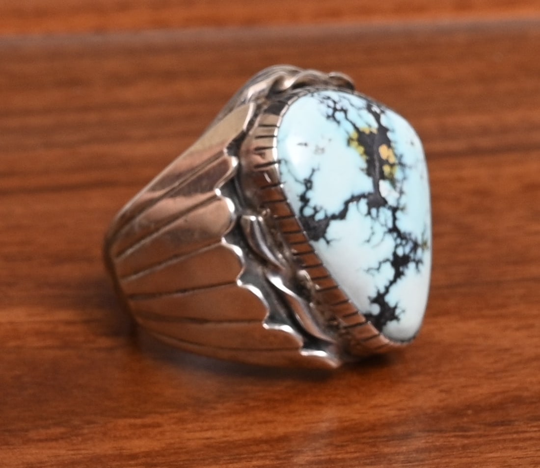 Navajo Turquoise Sterling Silver Ring: Navajo Turquoise Sterling Silver Ring 24 mm x 18 mm turquoise stone ring size 11 3/4, stamped "sterling" weight is 34 grams gross IN HOUSE SHIPPING within the Continental USA $25. DURING CHECKOUT, CHO