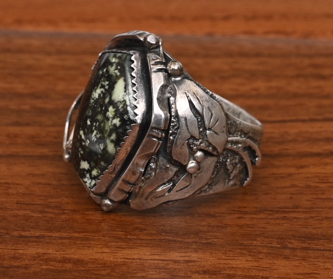 Dan Nieto Sterling Silver Ring, Zuni artist: Dan Nieto Sterling Silver Ring, Zuni artist leaf motif with green hard stone 15 mm x 21 mm ring size 12 1/2, weight is 24.1 grams gross stamped "Dan Nieto" "Sterling" IN HOUSE SHIPPING within the Cont