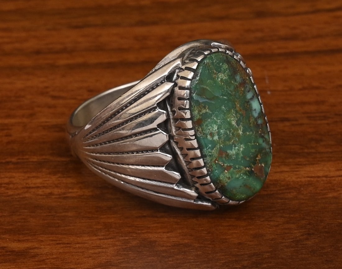 Castillo Draper Turquoise Sterling Silver Ring, Navajo artist: Castillo Draper Turquoise Sterling Silver Ring, Navajo artist 19 mm x 11 mm turquoise ring size 11 1/2, weight is 21.8 grams gross stamped "STERLING" "C. DRAPER" IN HOUSE SHIPPING within the Continent