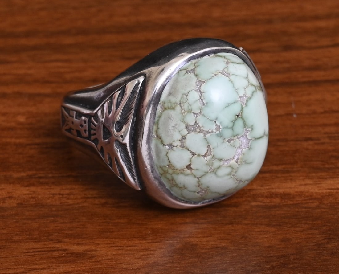 Native American Sterling Silver Turquoise Ring: Native American Sterling Silver Turquoise Ring with Thunderbird design shank 18mm x 22mm turquoise ring size 12 1/4, weight is 56.7 grams gross Unmarked IN HOUSE SHIPPING within the Continental USA $1