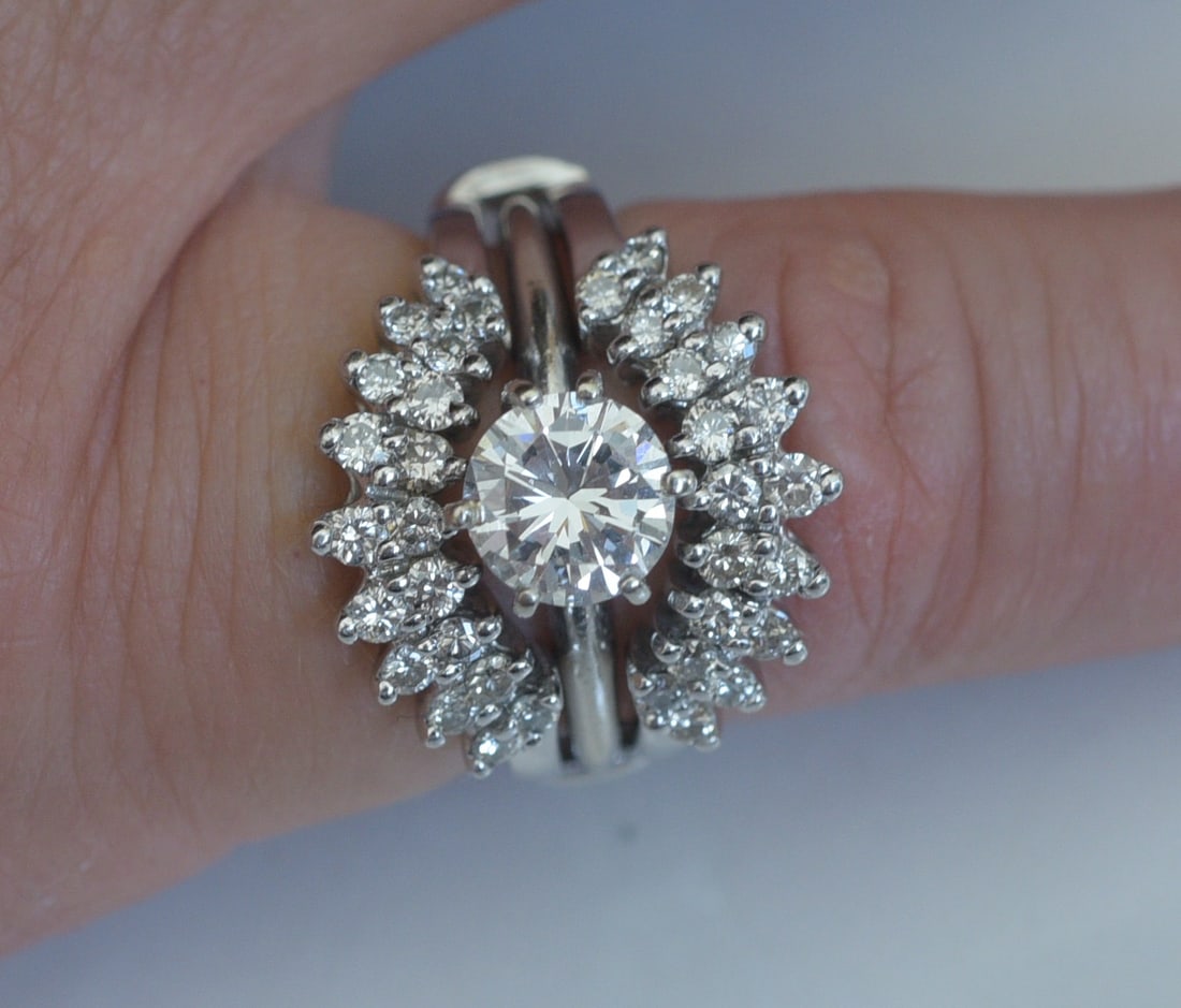14k Gold 1 ct Diamond Solitaire Ring with Diamond Ring Guard: 14k Gold Diamond Solitaire Ring diamond approximately 1 ct, J/K color, SI clarity, ring size 4 3/4 Diamond Ring Guard set with 36 diamonds, ring size 5 weight 7.8 grams gross IN HOUSE SHIPPING within 