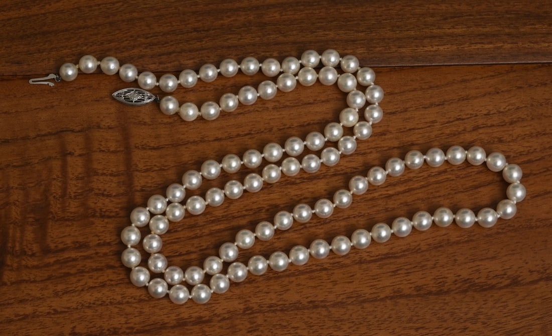 Strand of Cultured Pearls with 14k Gold Clasp: Strand of Cultured Pearls with 14k Gold Clasp 6 mm pearls, 28"" long, weight is 43.7 grams gross IN HOUSE SHIPPING within the Continental USA $15. DURING CHECKOUT, CHOOSE "ARRANGE MY OWN SHIPPING" if 