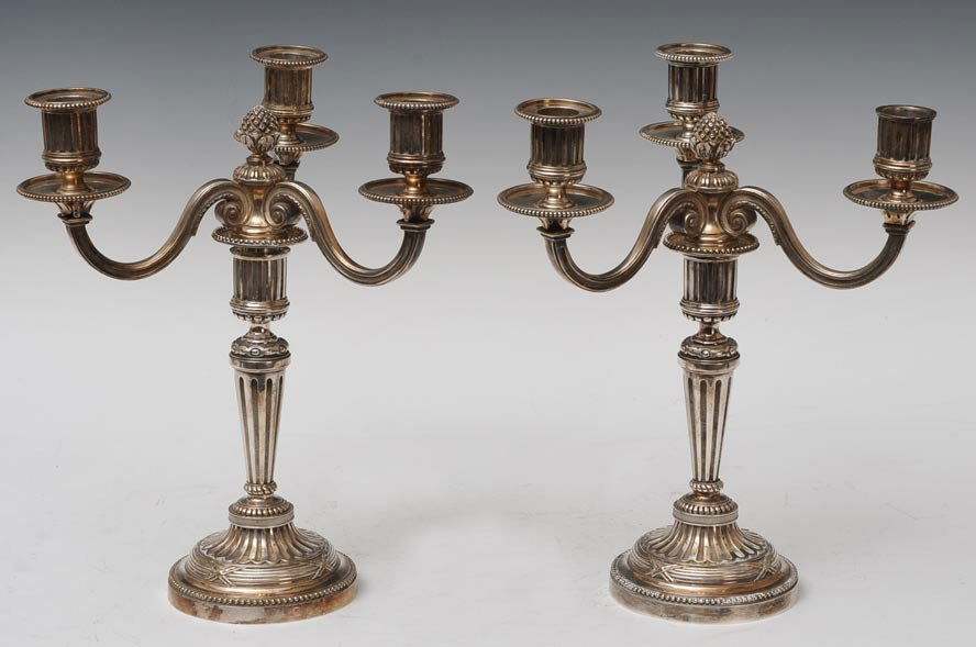 Pair of French Plated Silver Candelabra: Leon Lapar 11" high estimate 600/900 Shipping available within the Continental USA (excludes insurance) $50. International shippers are responsible for arranging 3rd party shipping.