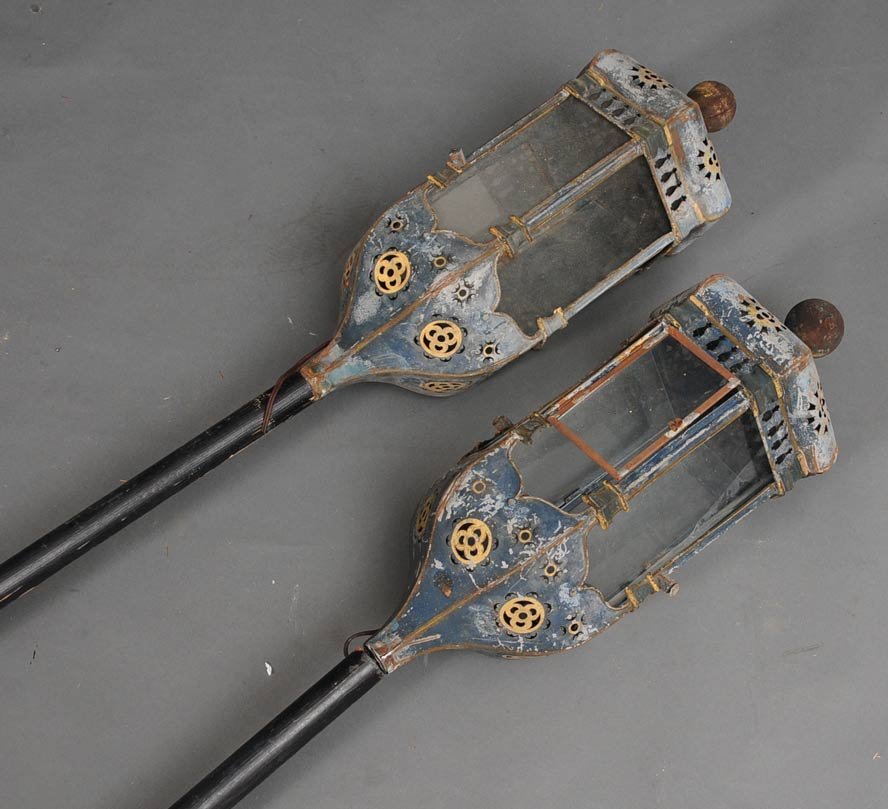 Pair of Venetian Tole Lanterns: now electrified with wooden ball finials and later added wooden standards each overall approximately 45" long estimate 500/750 Buyer is responsible for arranging 3rd party shipping.