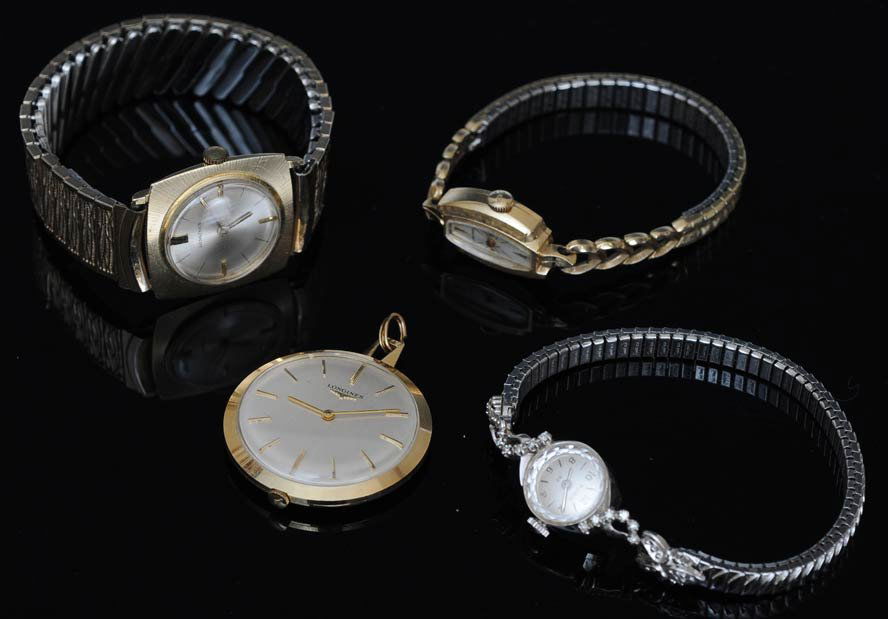 Group of Four Watches: including 14k Bulova, and three 14k Longines bands are not gold estimate 600/900 Bank of New York Shipping available within the Continental USA (excludes insurance) $20. International shippers are res
