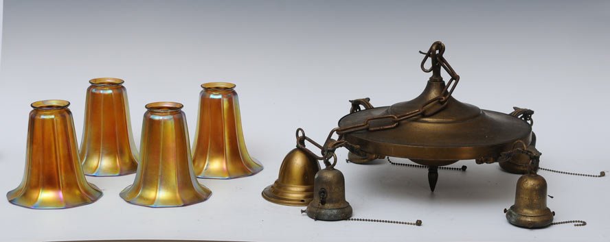 Brass Light Fixture with Steuben Shades: shades 5 5/8" high, fitter 2 1/4" high early 20th century estimate 400/600 SHIPPING INFORMATION Shipping available within the Continental USA (excludes insurance) $50. International buyers are respons