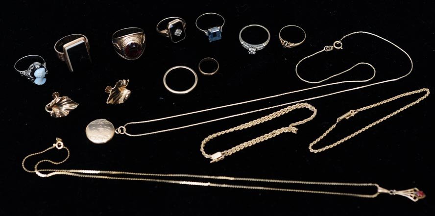 Group of Gold Jewelry: ranging from 10k to 14k 14 items total, including 9 rings, a pair of earrings, a locket, a necklace, and a pair of small bracelets 32 dwt gross,estimate 600/900 SHIPPING INFORMATION Shipping available