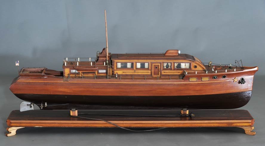 Impressive Scratch Built Model of Yacht: with fitted interior cabin under lift-off top 59" long initialed and dated 1941 between lifts estimate 1200/1800 SHIPPING DETAILS: Buyer is responsible for arranging 3rd party shipping.