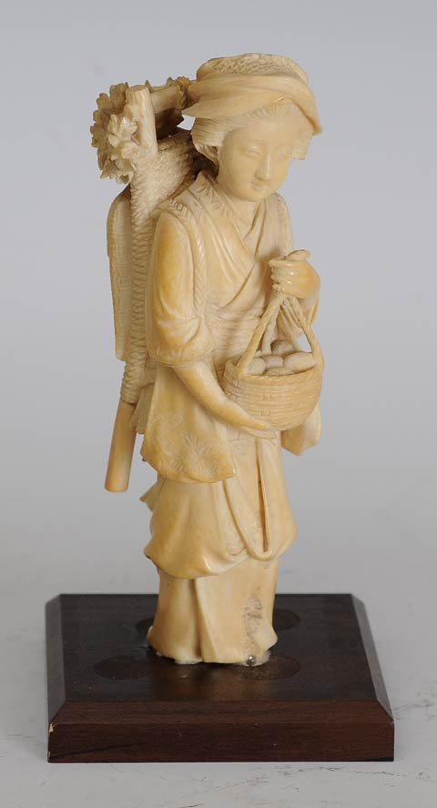 Japanese Ivory Okimono Figure: Peasant Woman with a Basket of Eggs 5 1/2" high late 19th century estimate 300/500 SHIPPING DETAILS: The buyer is responsible for obtaining any documents necessary for export. Shipping available withi