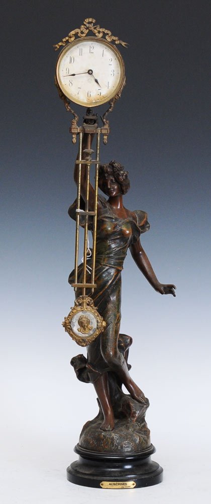Ansonia Swinger Clock: 28 1/2" high with French white metal figure adapted to replace Ansonia figure, the swinger arm and mechanism are all original SHIPPING DETAILS: Shipping available within the Continental USA (excludes 